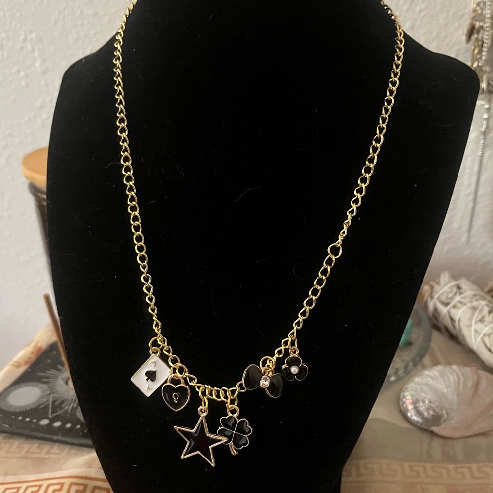 Black and gold charm necklace
